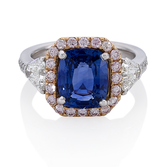 Platinum and 18ct rose gold cushion cut blue sapphire and pink diamond ring