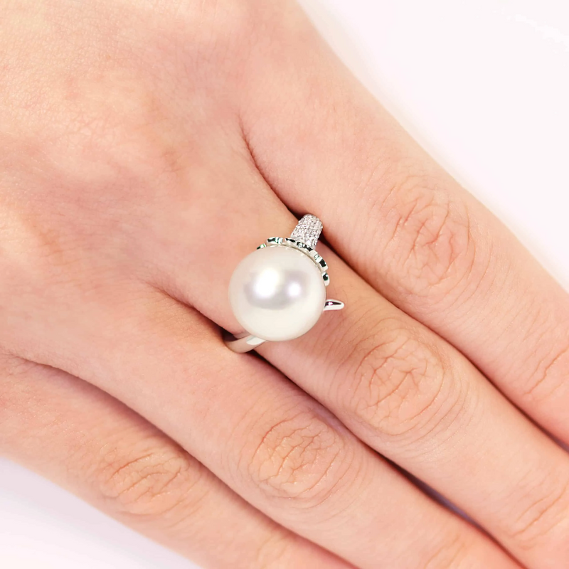 18ct white gold South Sea pearl and diamond ring on the finger