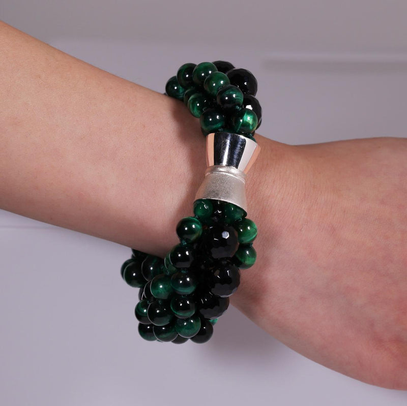 Green tiger eye and onyx beaded bracelet from the Carmela Cerrone Collection on the wrist