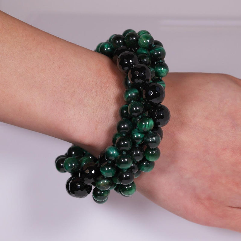Green tiger eye and onyx beaded bracelet from the Carmela Cerrone Collection on the wrist
