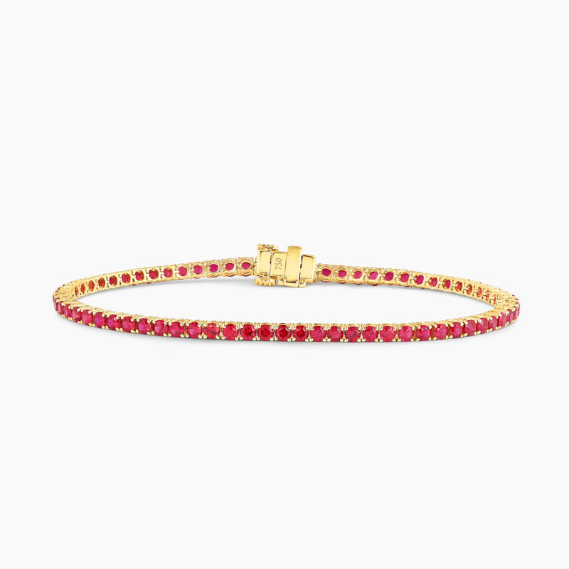 18ct yellow gold 4.57ct round ruby four claw set bracelet