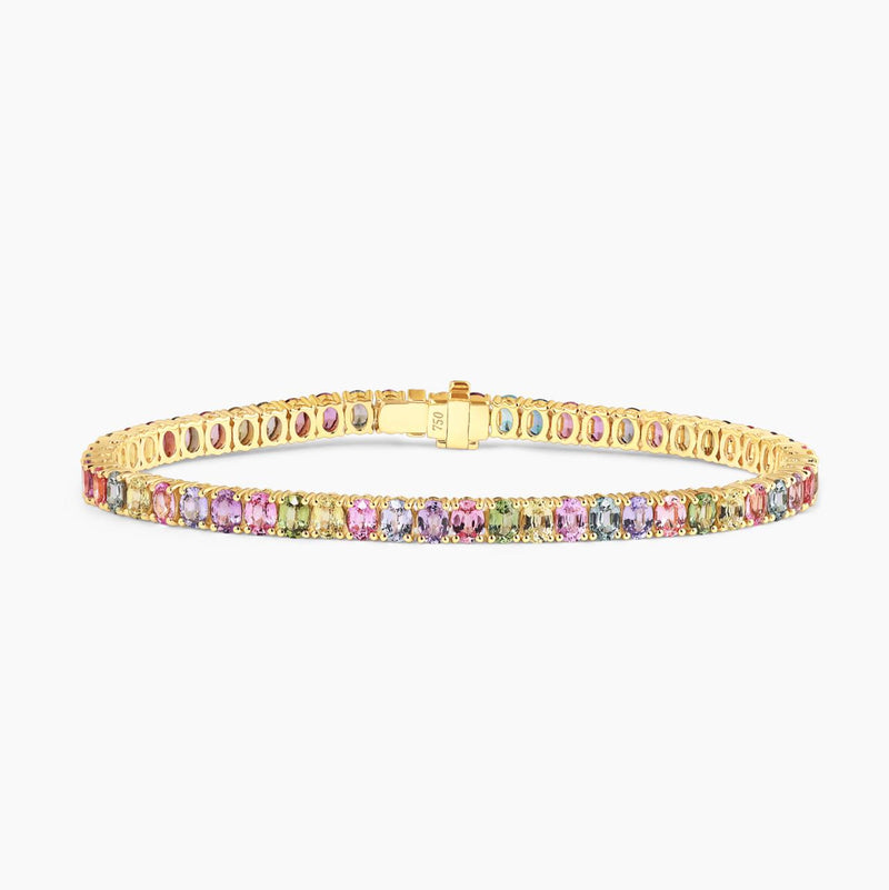 18ct yellow gold 11.29ct oval multi-colour sapphire four claw set bracelet
