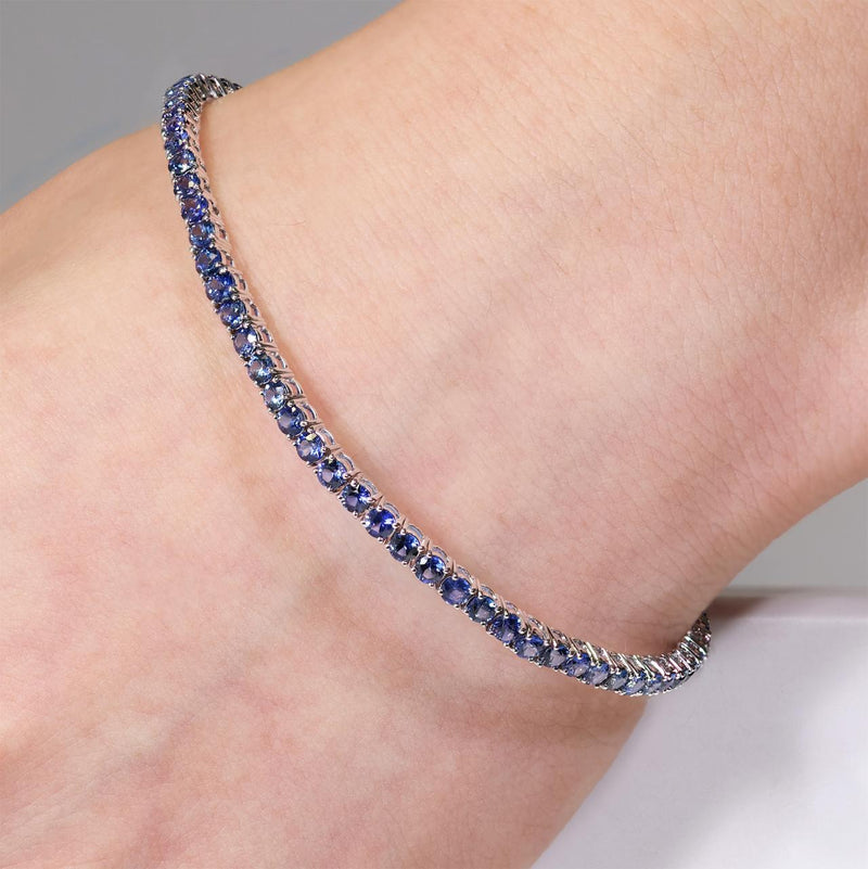 18ct white gold 3.84ct blue sapphire bracelet on the wrist