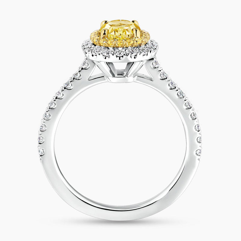 Platinum and 18ct yellow gold 1.04ct Fancy Intense Yellow oval and round diamond double halo ring