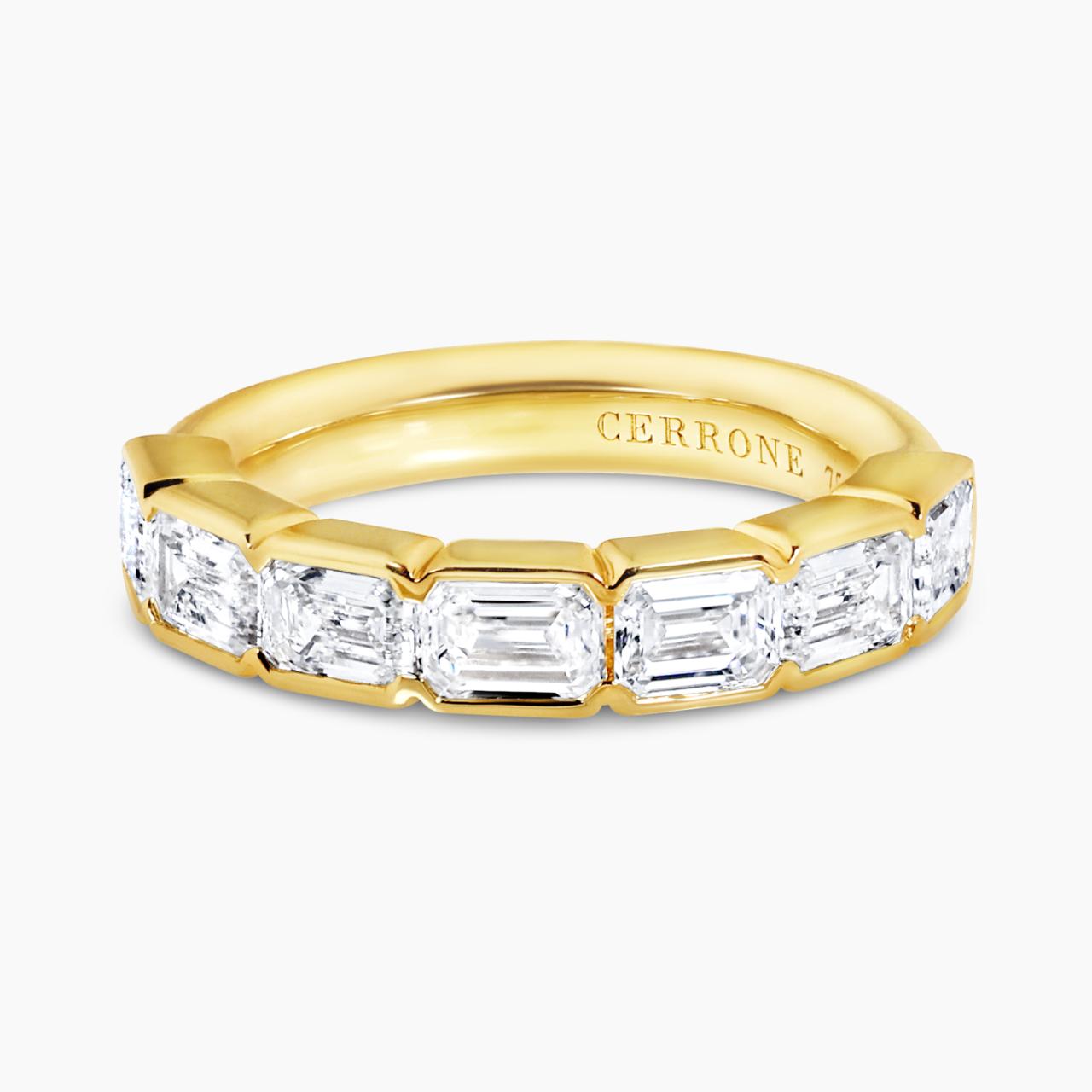 18ct yellow gold emerald cut diamonds ring in a half bezel setting