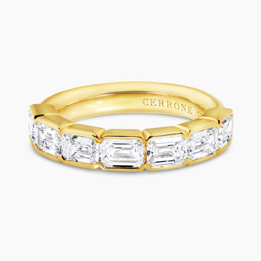 18ct yellow gold emerald cut diamonds ring in a half bezel setting
