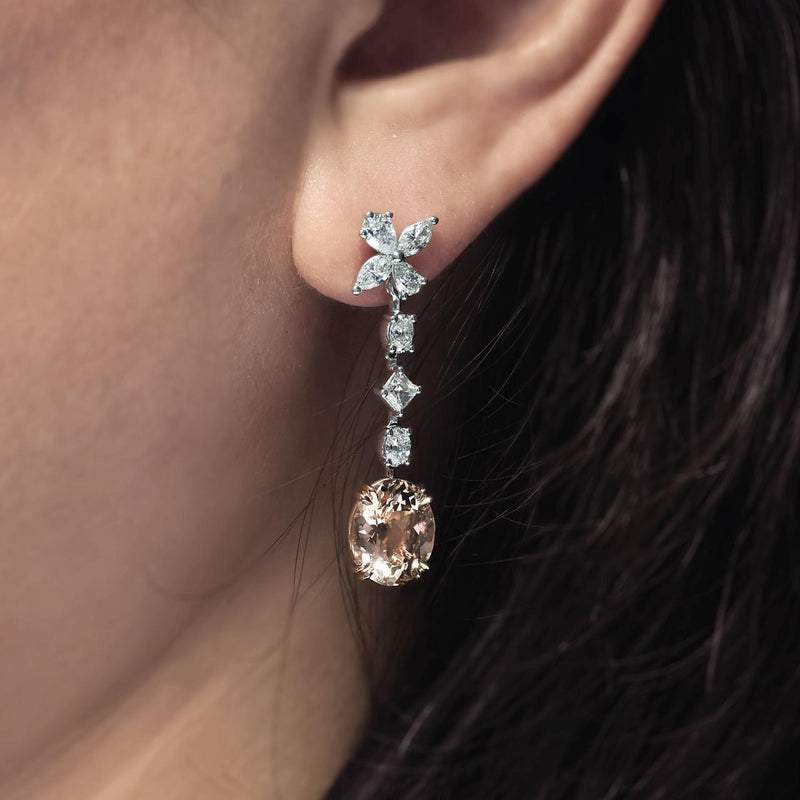 18ct white and rose gold morganite and marquise, oval, asscher and pear shaped diamonds drop earrings on ear