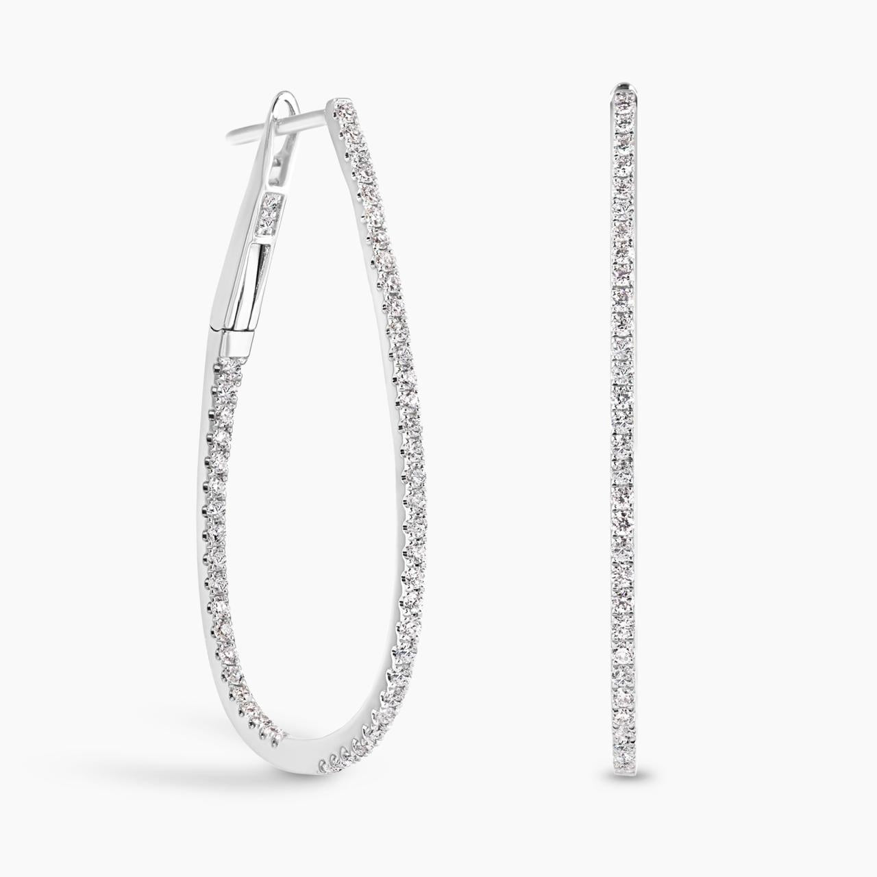 18ct white gold 106=0.74ct claw set round brilliant cut diamond pear shape hoop earrings