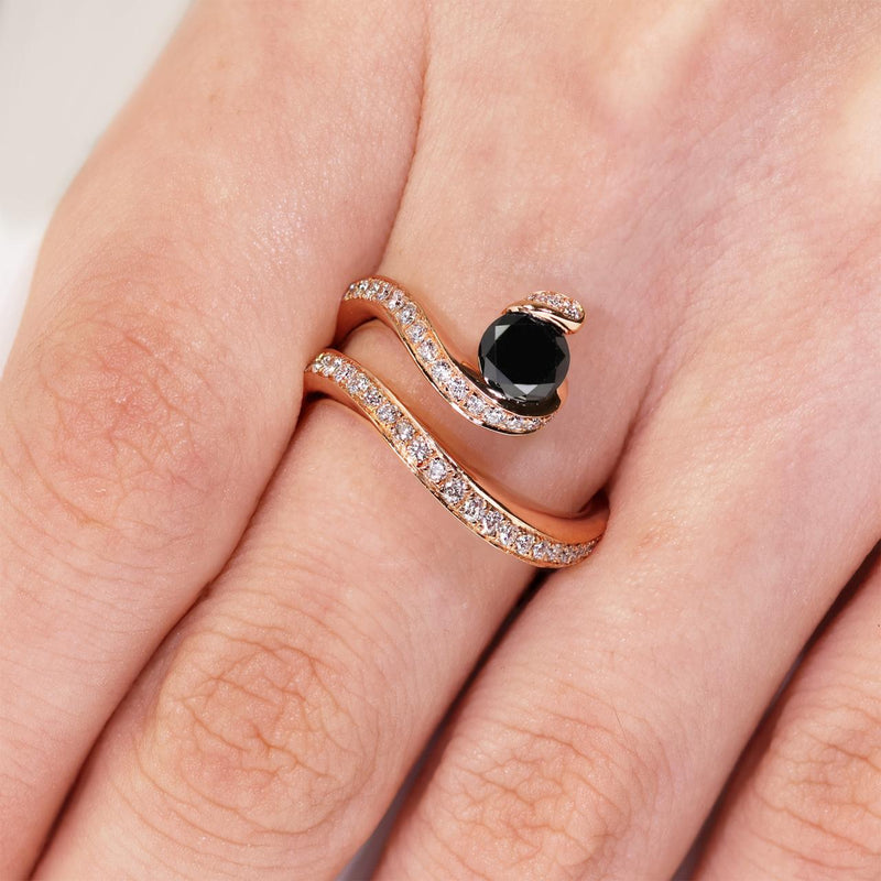 18ct rose gold round black diamond ring on the finger