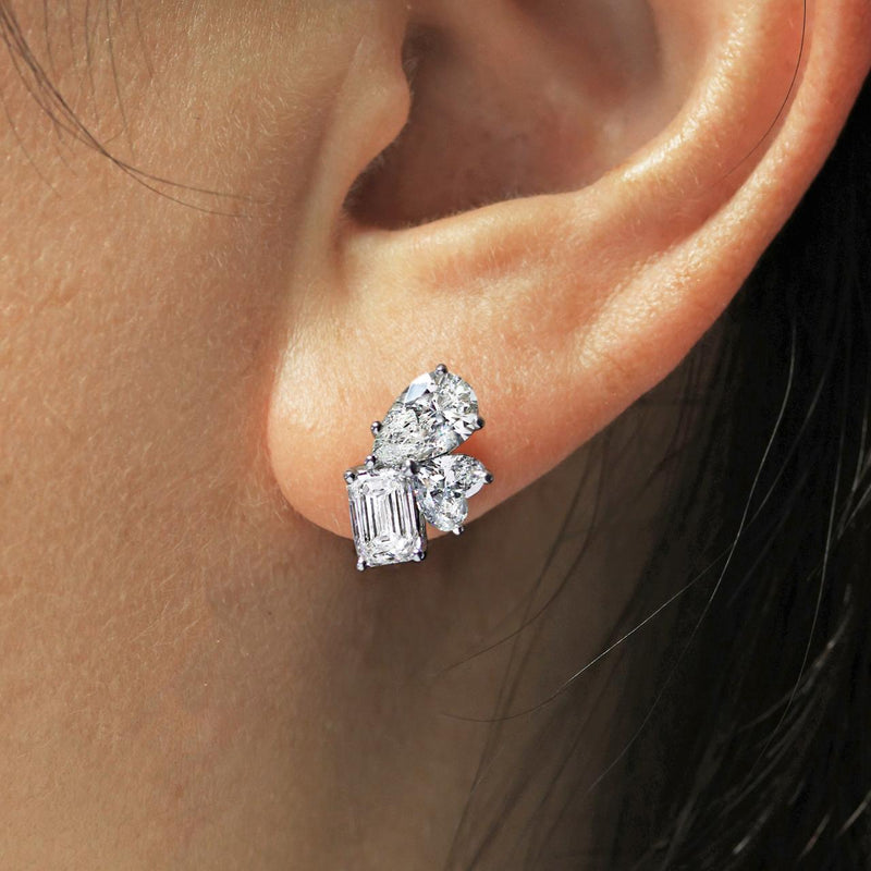 18ct white gold heart, emerald and pear cut LAB Grown Diamond stud earrings on ear