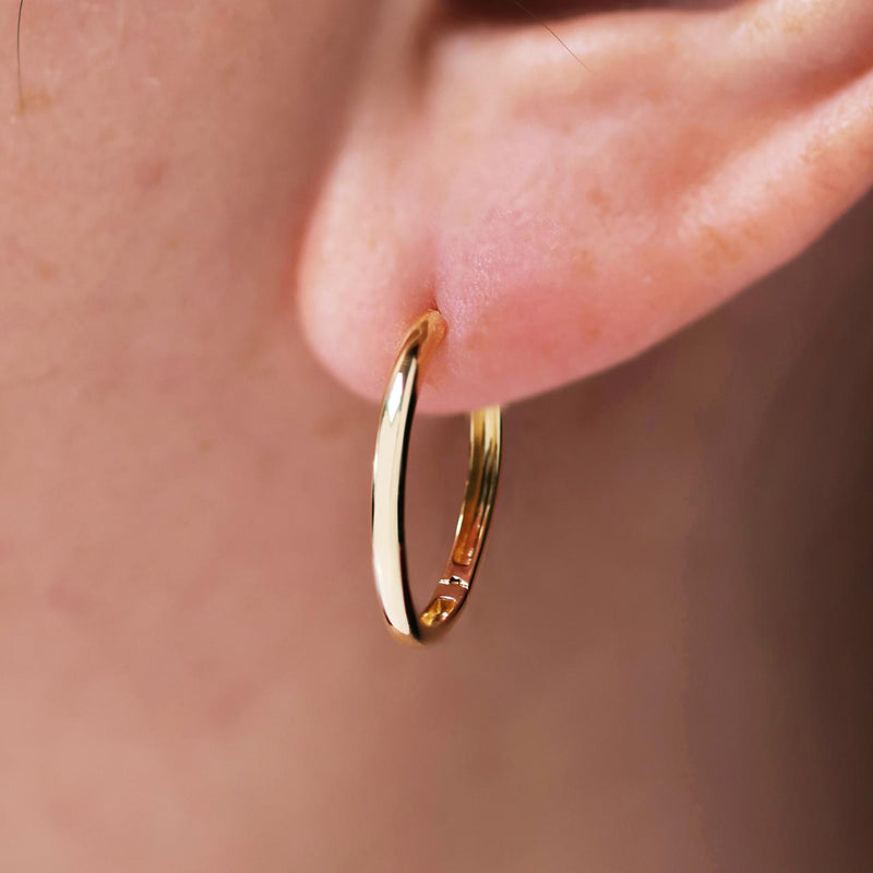 18ct yellow gold 12mm sleeper hinge hoop earrings on ear