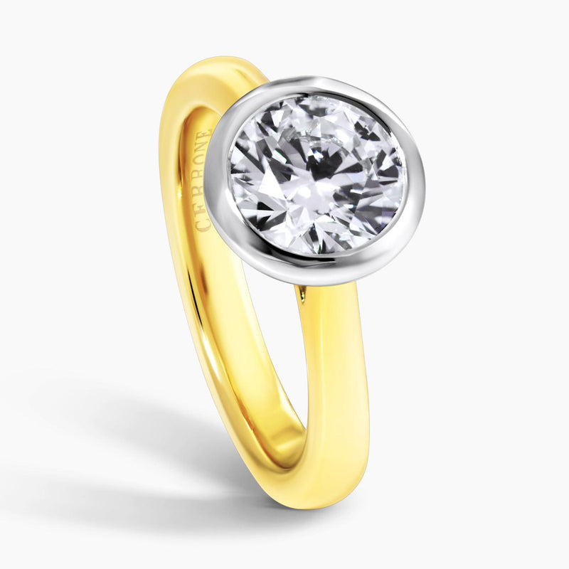 18ct yellow and white gold round brilliant cut laboratory grown diamond bezel set ring side profile