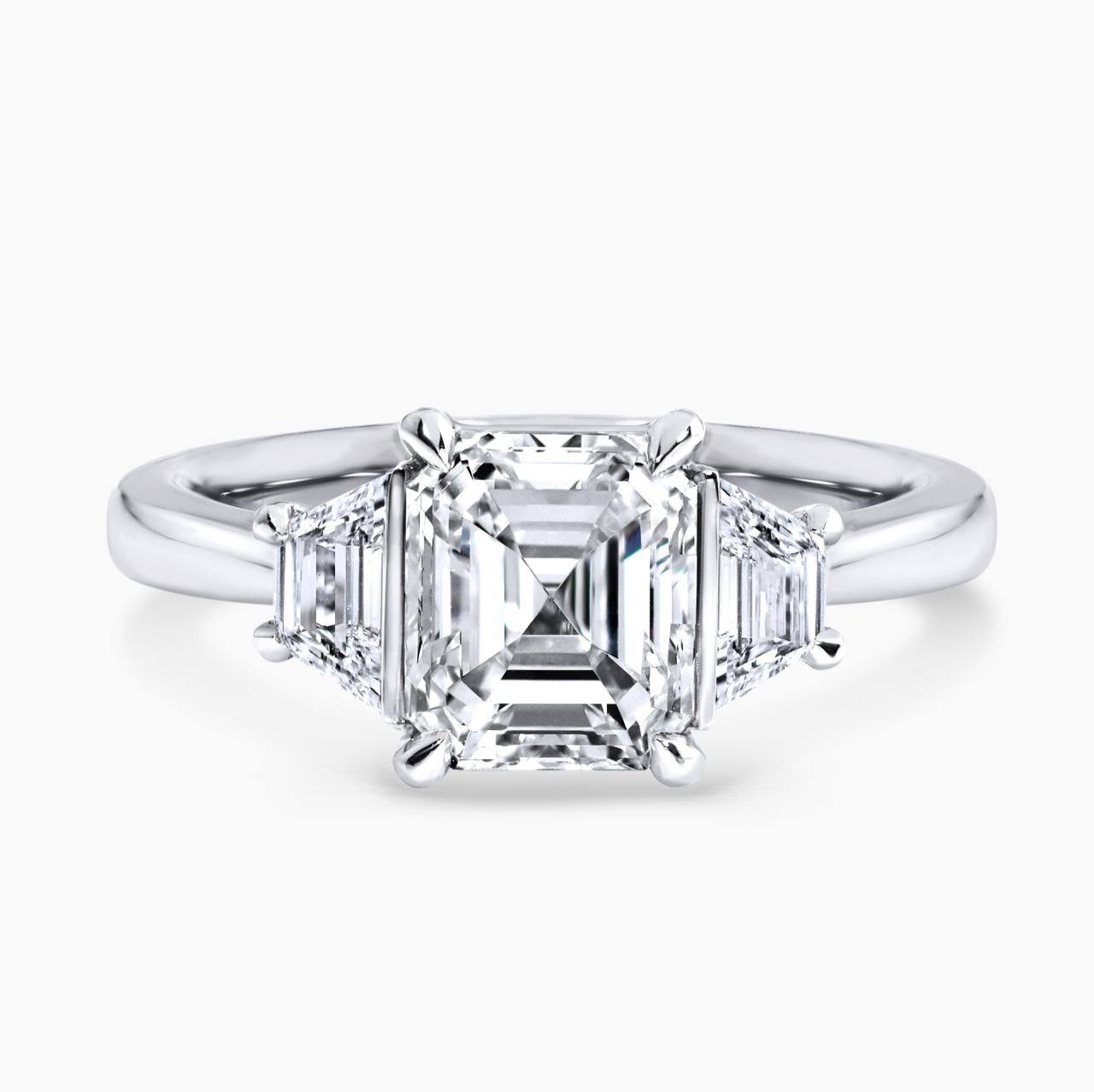 EVELINA - Platinum emerald cut and trapezoid step cut diamond ring