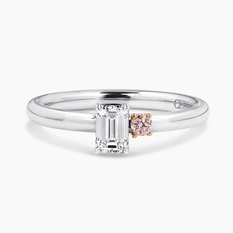 18ct white and rose gold emerald cut diamond and Argyle round brilliant cut diamond engagement ring