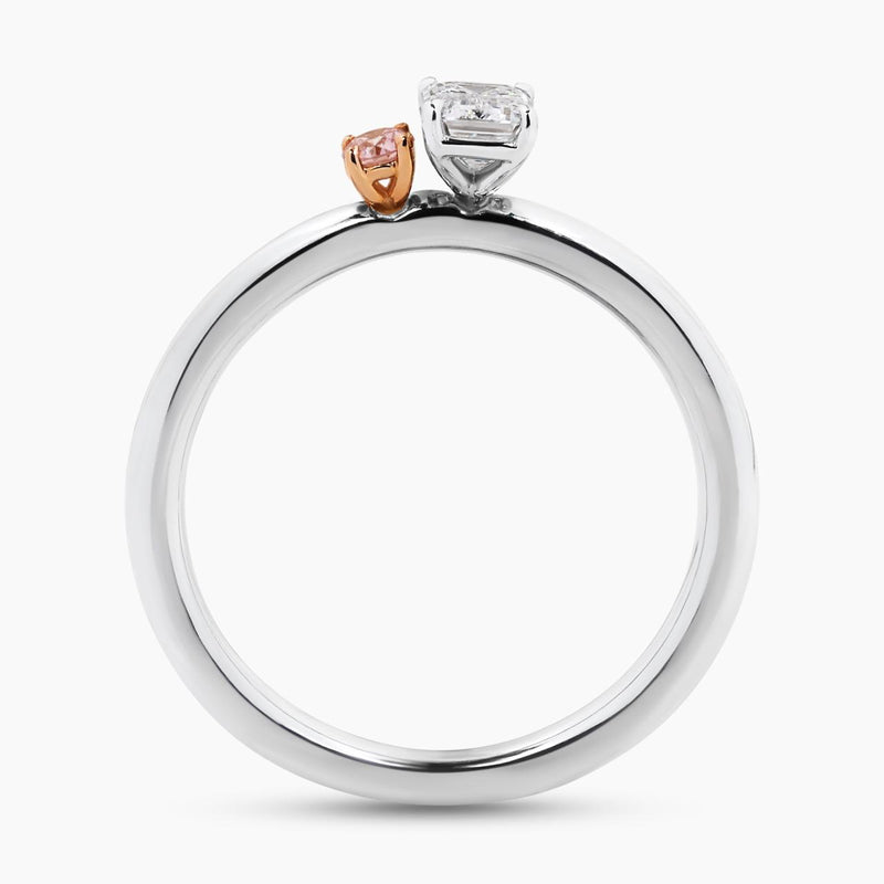 18ct white and rose gold emerald cut diamond and Argyle round brilliant cut diamond engagement ring side view