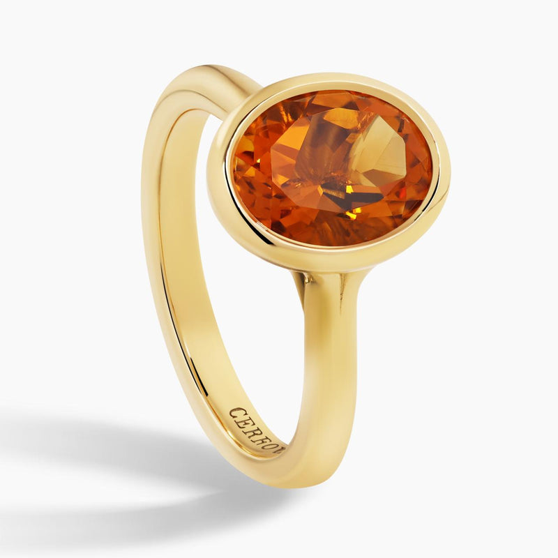 18ct yellow gold oval citrine ring in a bezel setting