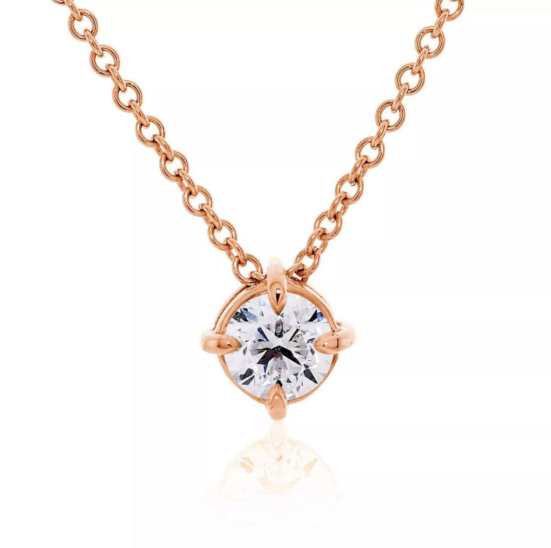 18ct rose gold round diamond necklace in a four claw setting