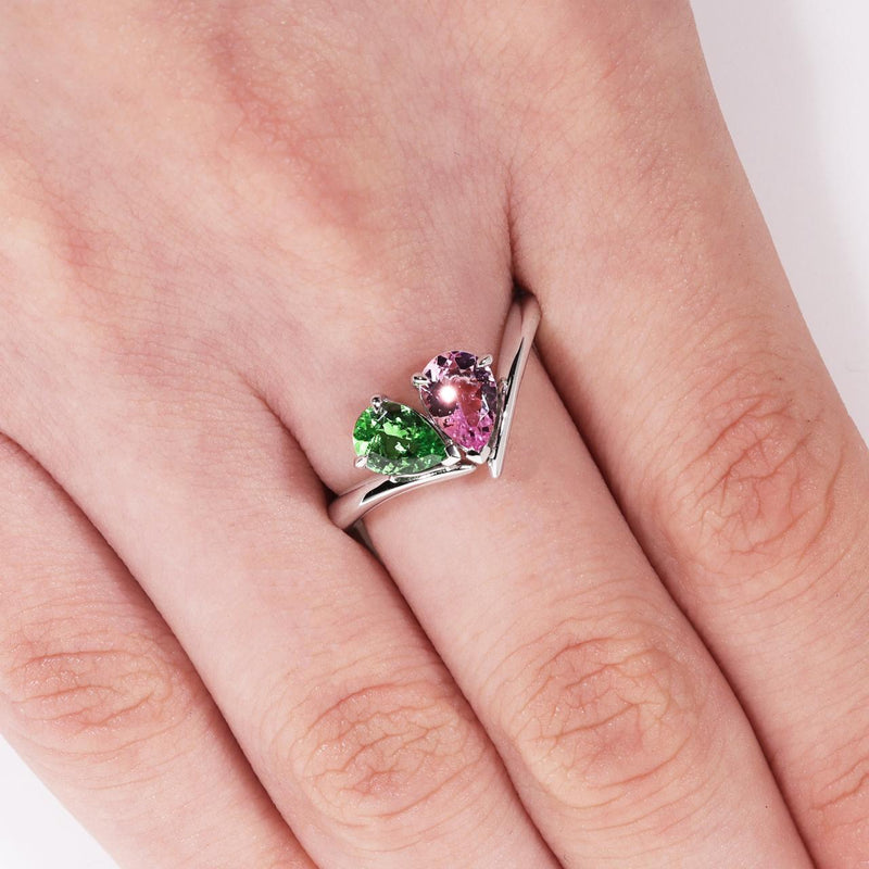 18ct white gold pear shaped garnet and morganite ring on the finger