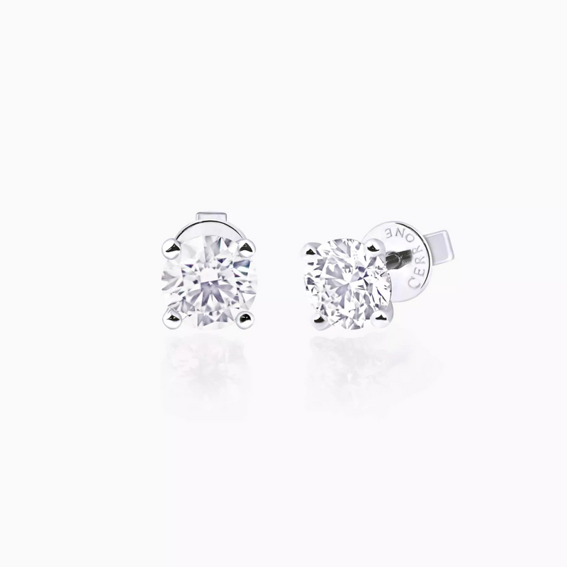 18ct white gold round brilliant cut diamond solitaire stud earrings in a four claw setting