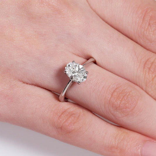 18ct white gold oval LAB Grown diamond ring with hidden halo on the finger