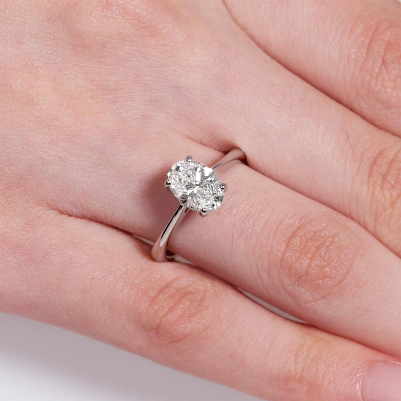 18ct white gold oval LAB Grown diamond ring with hidden halo on the finger
