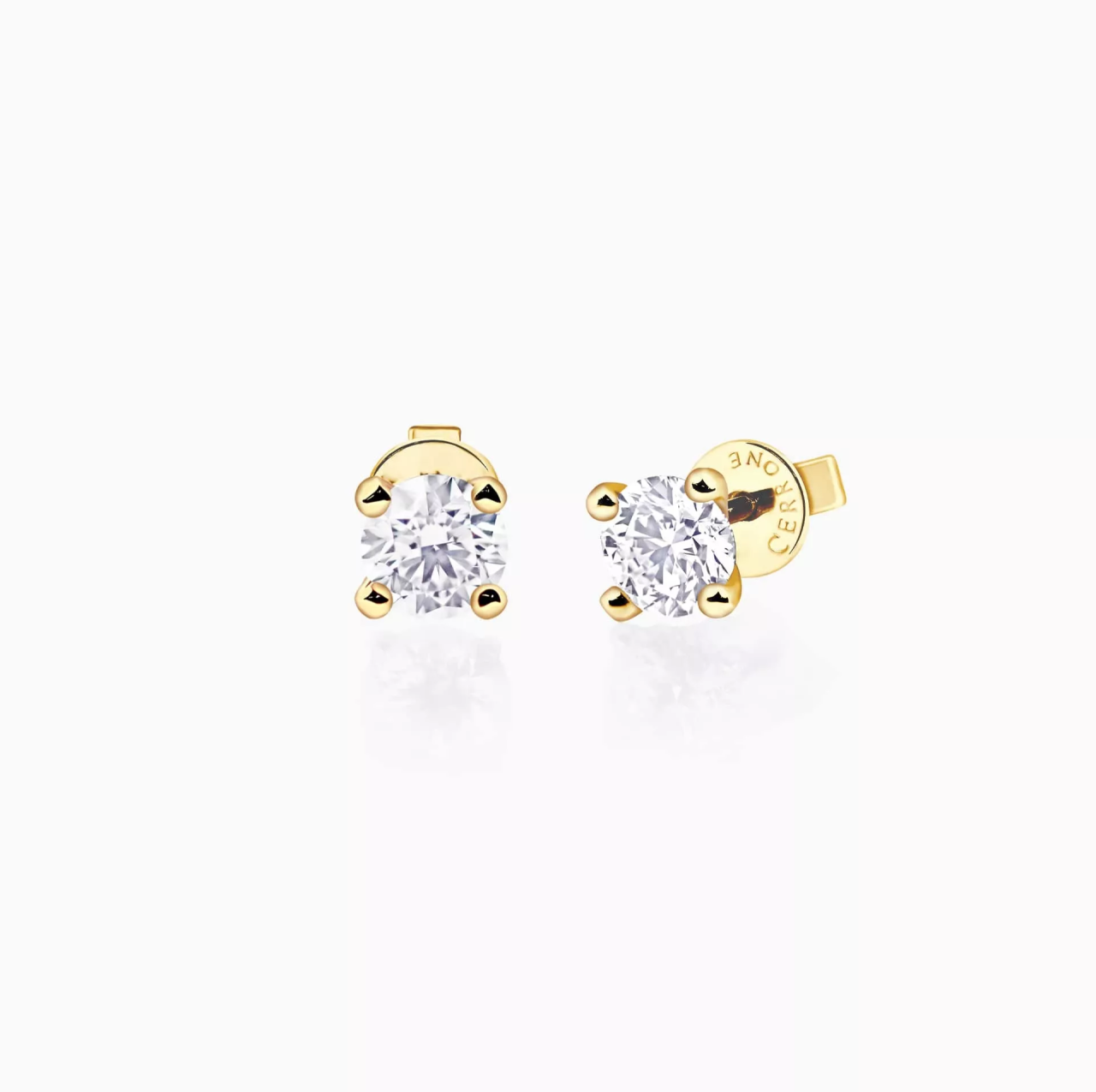 18ct yellow gold 2=0.53ct FG VS round brilliant cut diamond solitaire stud earrings in a four claw setting