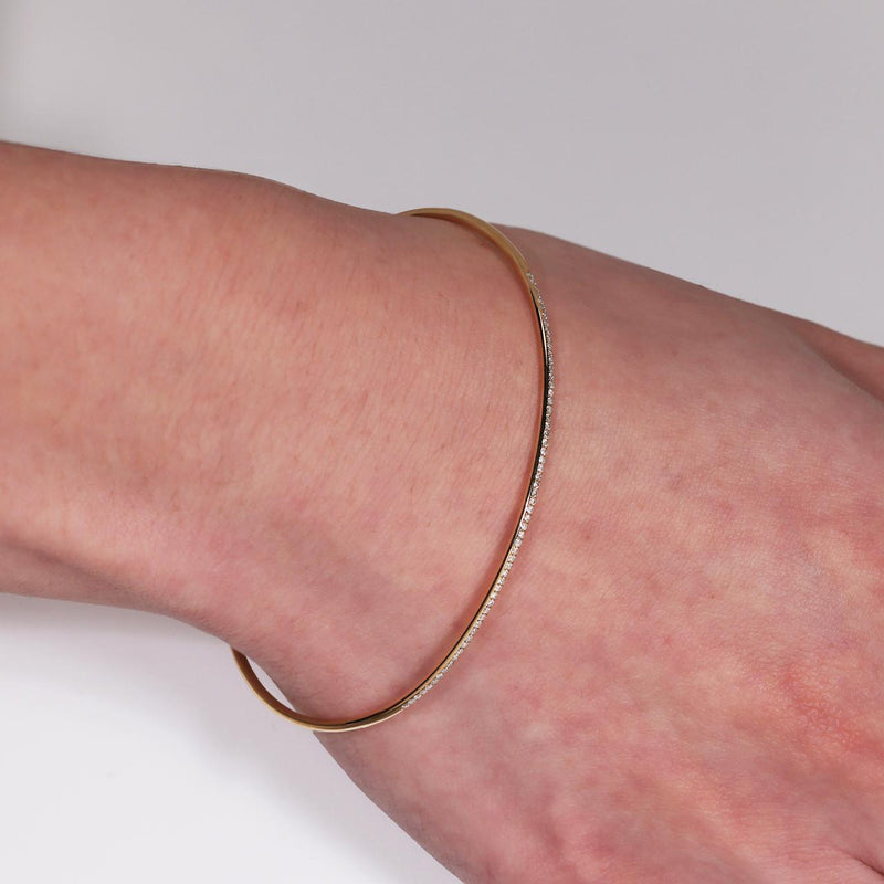 18ct yellow gold open diamond bracelet on wrist