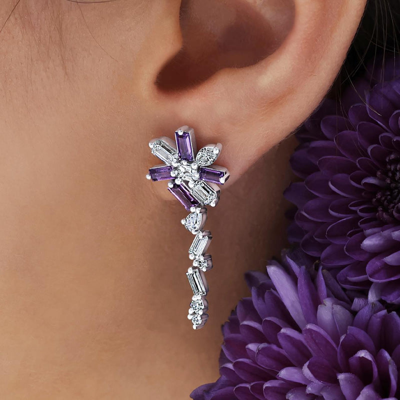 18ct white gold diamond and baguette purple sapphire drop earrings on ear