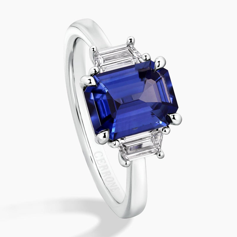 18ct white gold emerald cut blue sapphire and tapered baguette diamonds set ring