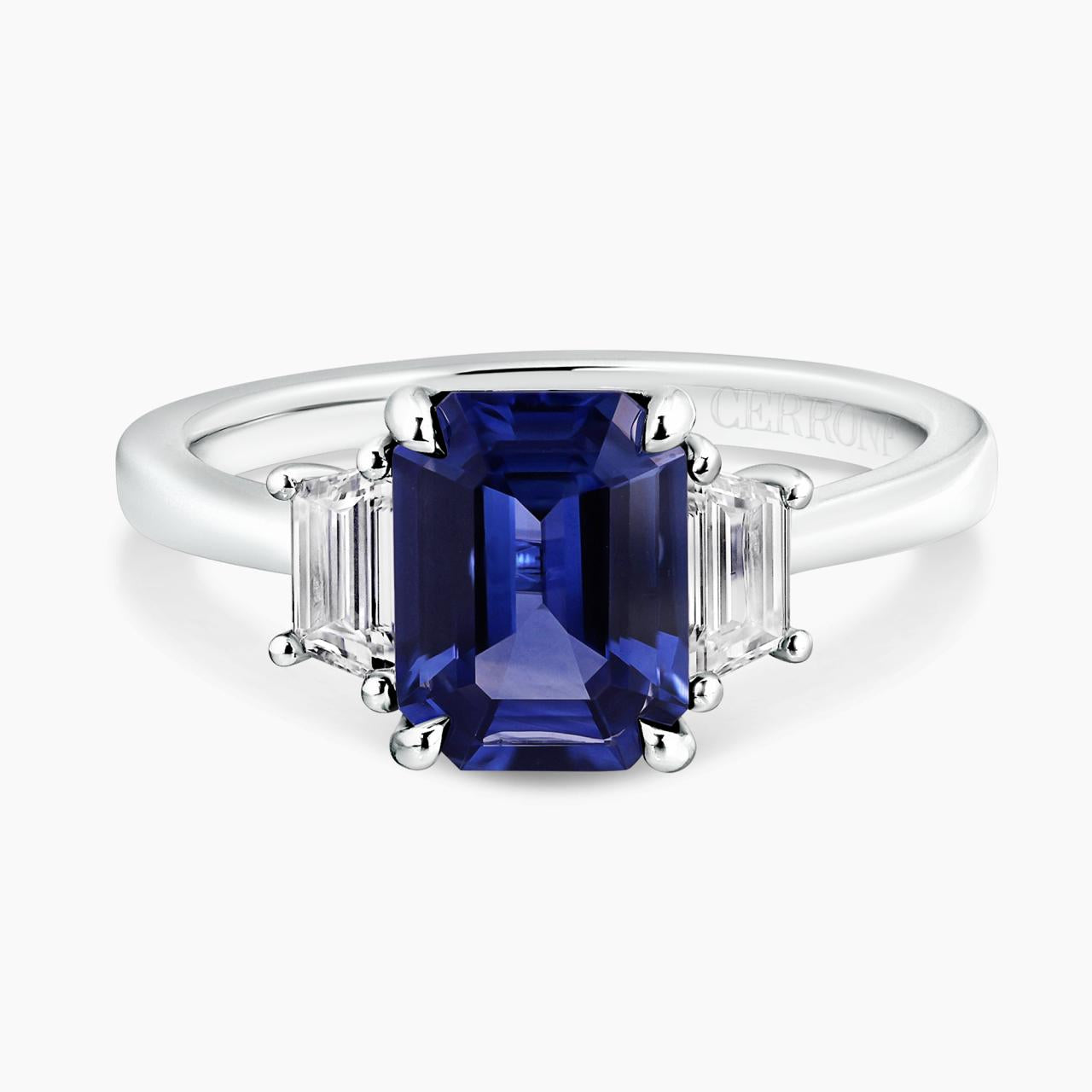 18ct white gold emerald cut blue sapphire and tapered baguette diamonds set ring