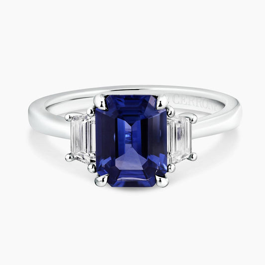 18ct white gold emerald cut blue sapphire and tapered baguette diamonds set ring