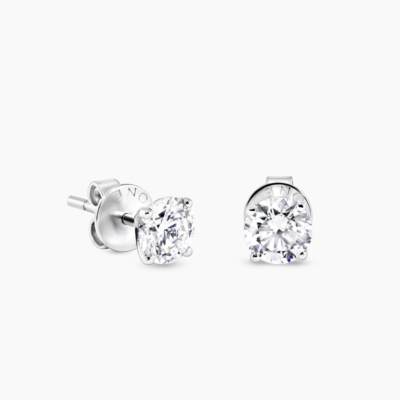 18ct white gold round brilliant cut solitaire diamond stud earrings in a four claw setting