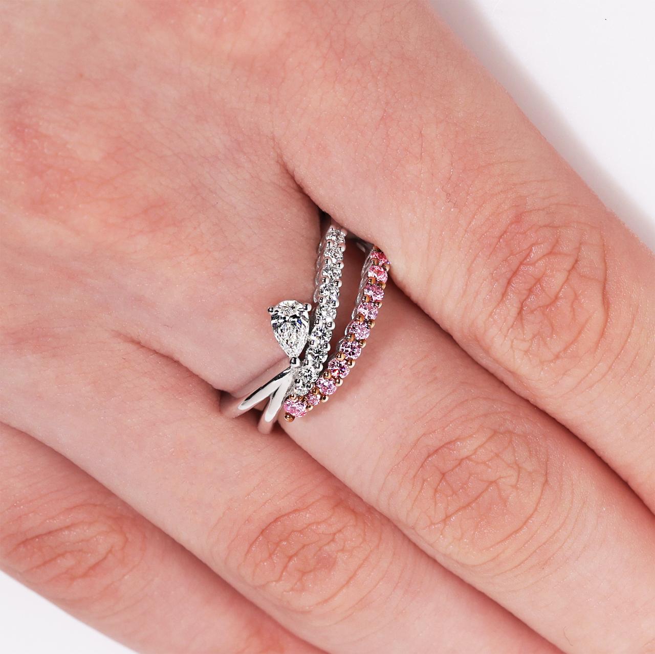 18ct white gold 1=0.21ct pear shaped diamond ring with argyle round brilliant cut diamonds