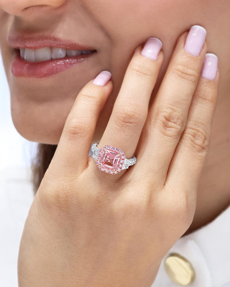 Platinum and 18ct rose gold octagonal step cut natural pink Madagascan Padparadscha unheated sapphire and Argyle Pink diamond ring on the finger