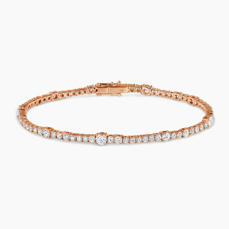 18ct rose gold 3.98ct diamond tennis bracelet in a four claw setting