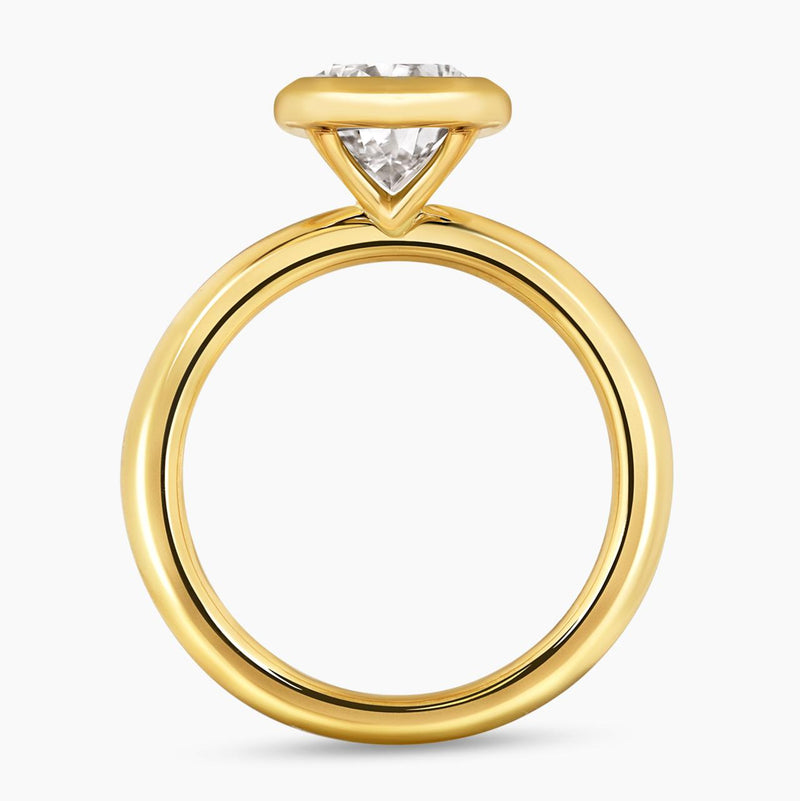 18ct yellow gold pear shaped LAB Grown Diamond bezel set solitaire ring side profile