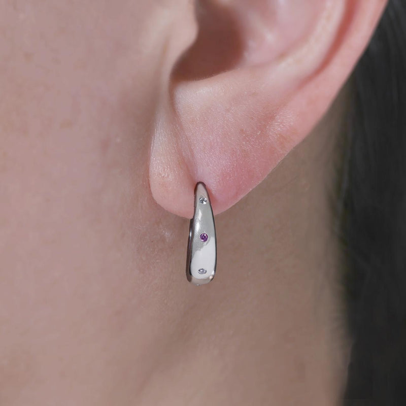 18ct White gold pink diamond hoop earrings on ear