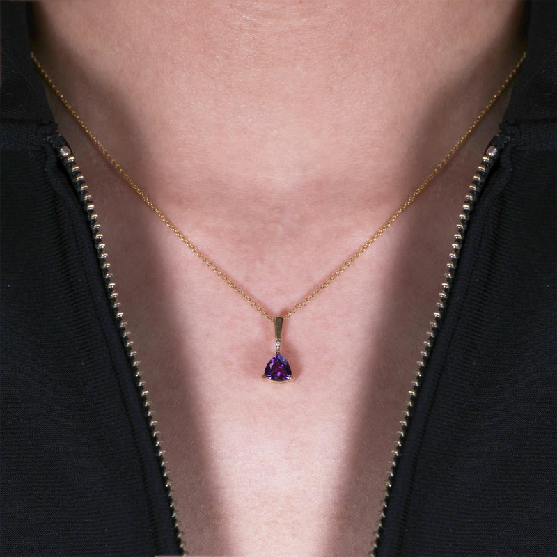 18ct yellow gold triangle amethyst and diamond necklace on the neck