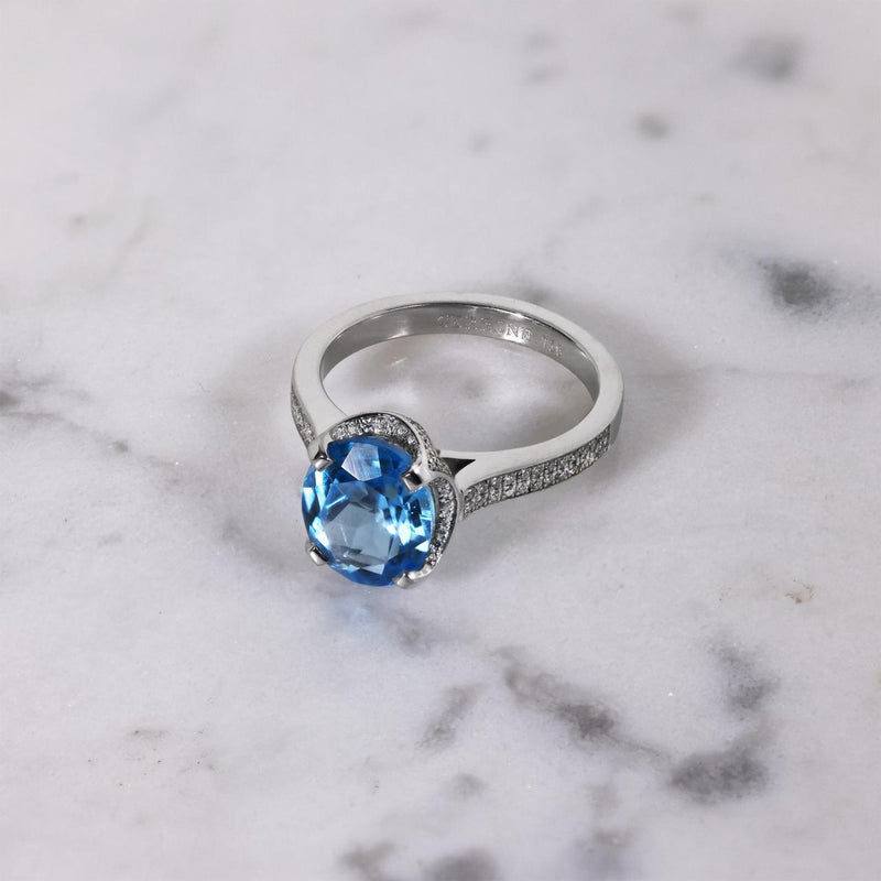 18ct white gold oval Swiss blue topaz and diamond ring