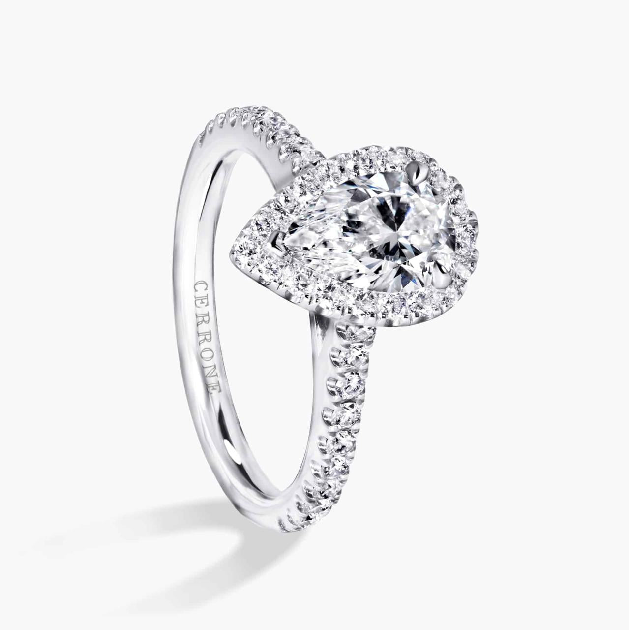 18ct white gold 1.02ct pear and round brilliant cut diamond halo ring