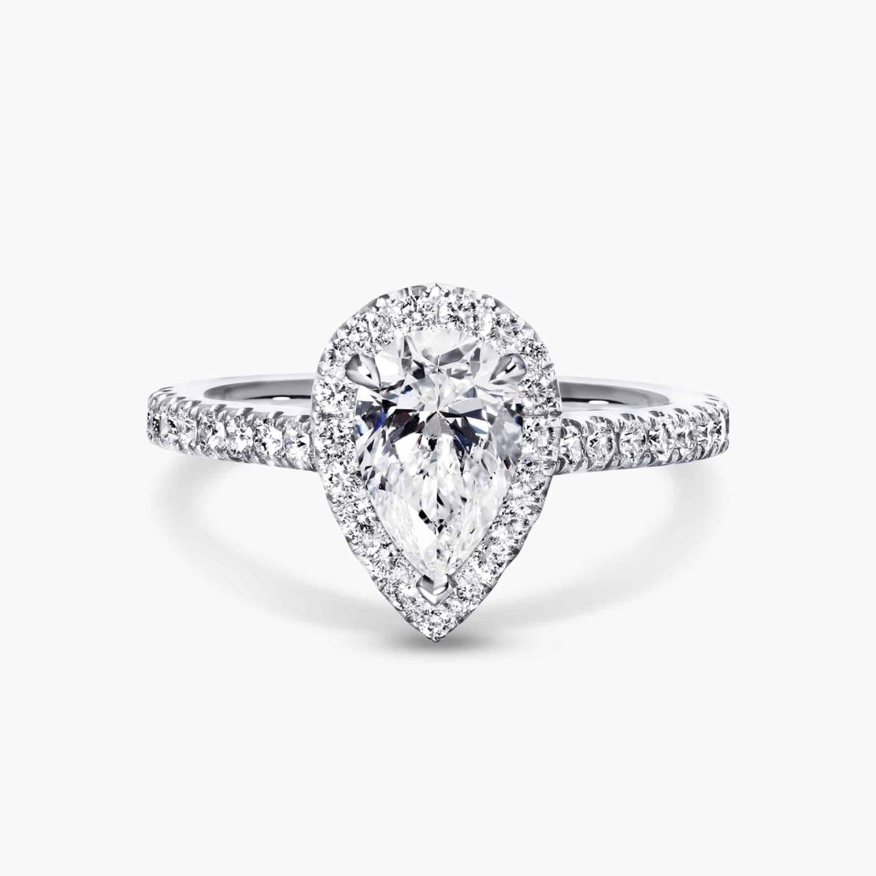 18ct white gold 1.02ct pear and round brilliant cut diamond halo ring