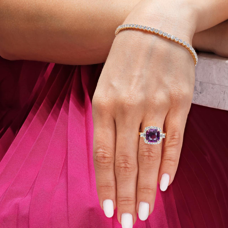18ct yellow gold Asscher cut amethyst and diamond claw set  ring on the finger