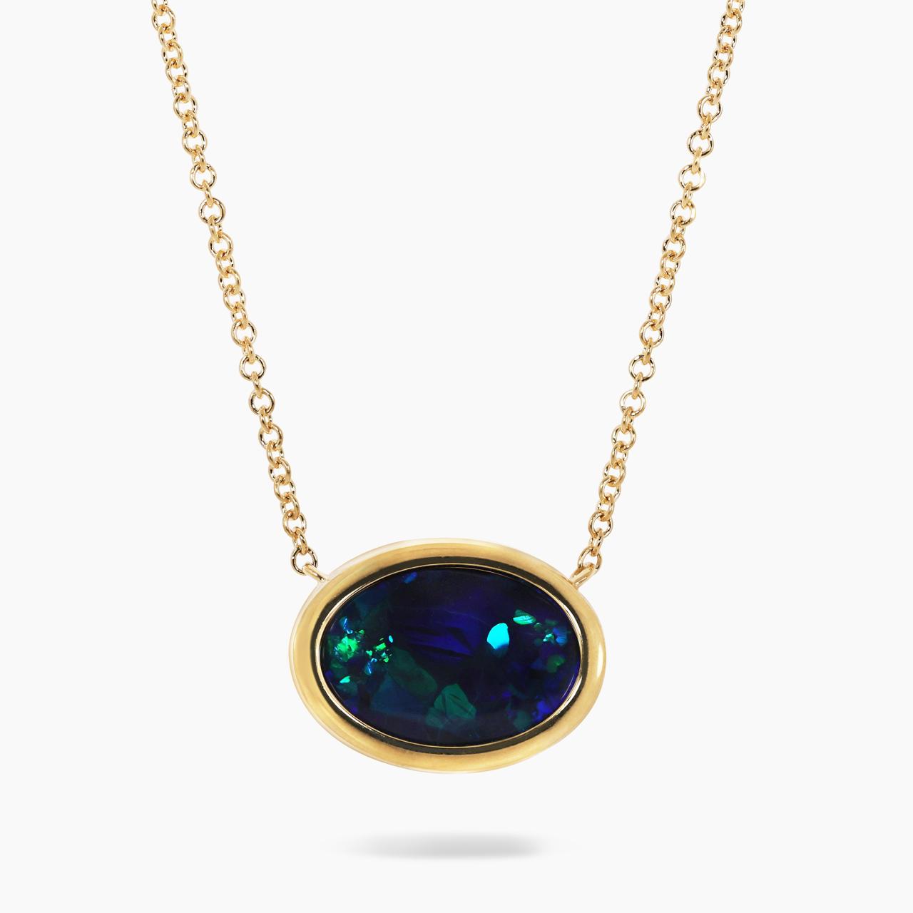 18ct yellow gold 2.60ct oval cut solid black Lightning Ridge Opal bezel set  on an 18ct yellow gold 45cm chain