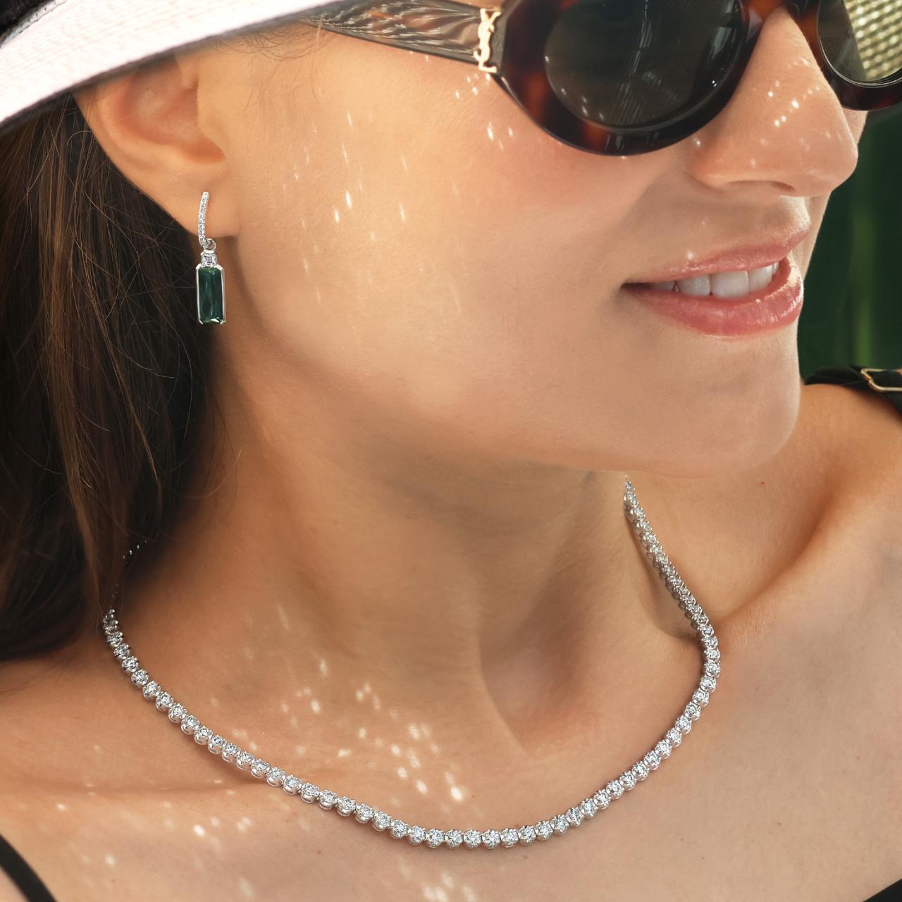 18ct white gold 2=4.60ct Brazilian green tourmaline baguettes and diamond drop earrings