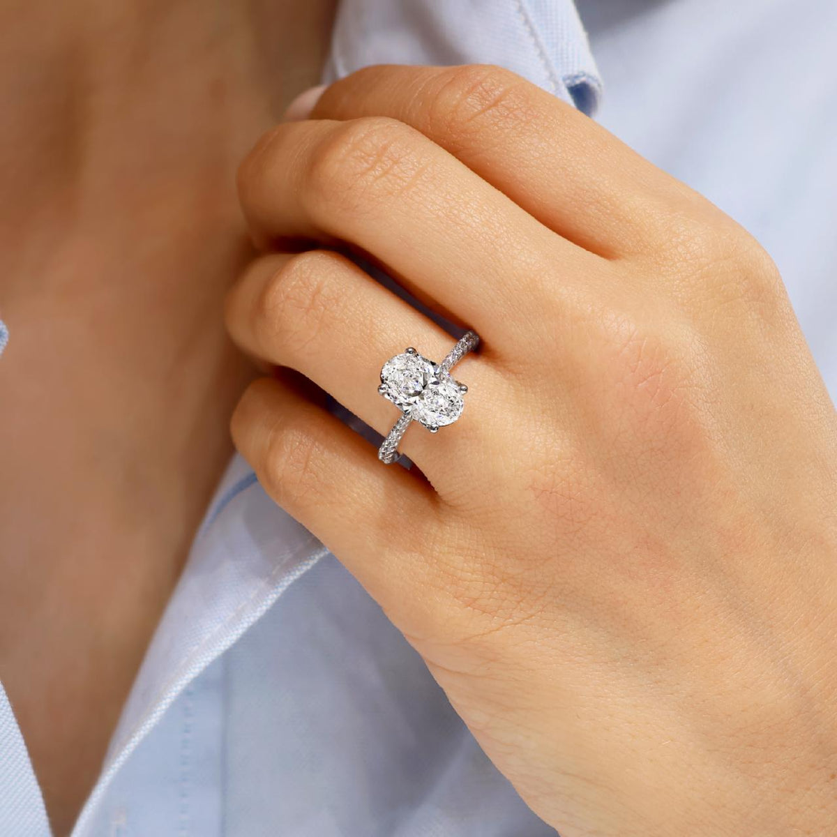EMANUELA 18ct white gold 3.01ct oval brilliant cut diamond engagement ring with diamond band