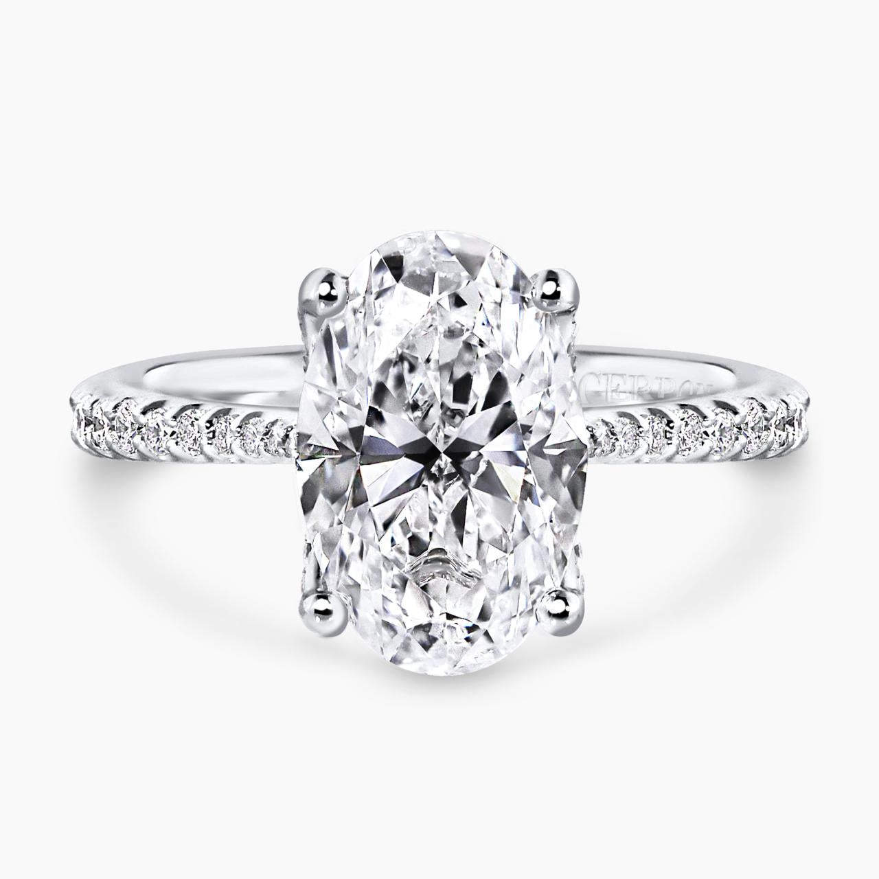 18ct white gold 3.01ct oval brilliant cut diamond ring with diamond band