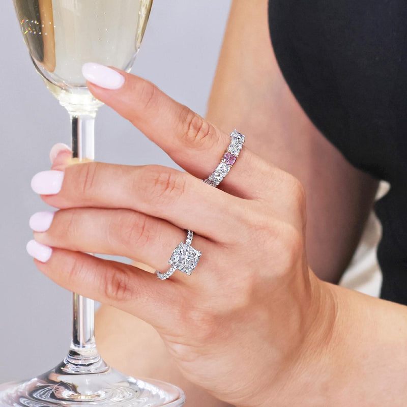 18ct white gold 4.01ct cushion cut diamond ring in a four claw setting on finger