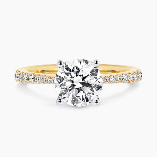18ct yellow and white gold round brilliant cut diamond ring with diamonds on the band