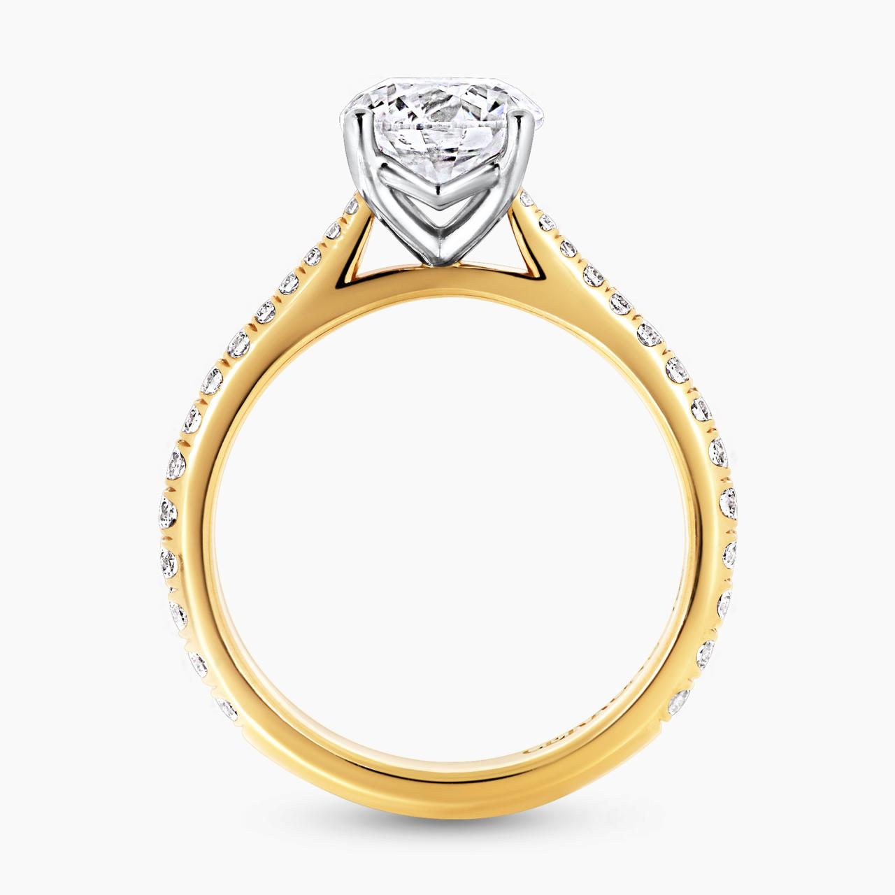 18ct yellow and white gold 1.50ct round brilliant cut diamond ring with diamonds on the band