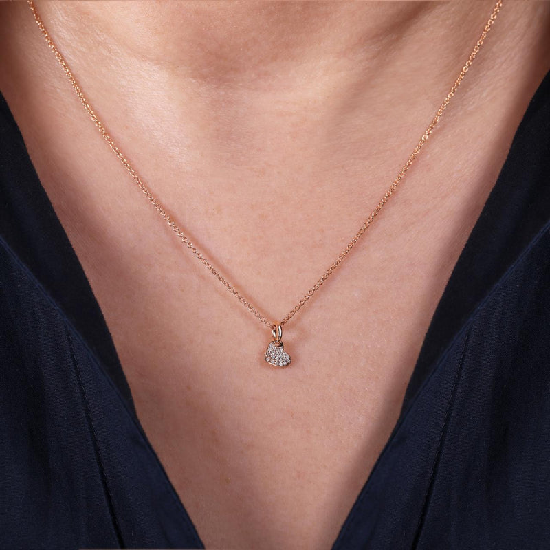 18ct rose gold diamond set heart charm on the neck 